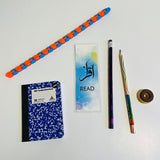 Bookmark, mini notebook, pencils, pull apart food eraser and wacky track fidget toy